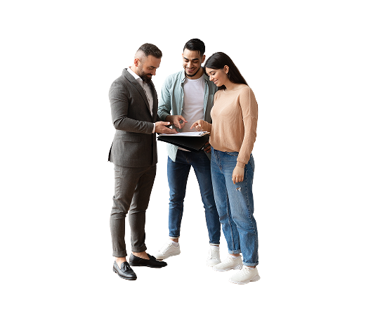 people standing around a paper and reading